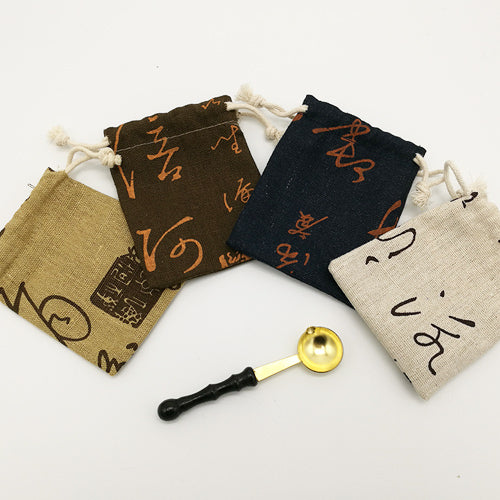 Burlap Gift Bag of Different Sizes and Melting Spoon